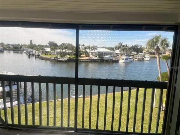 a view of a lake from a balcony
