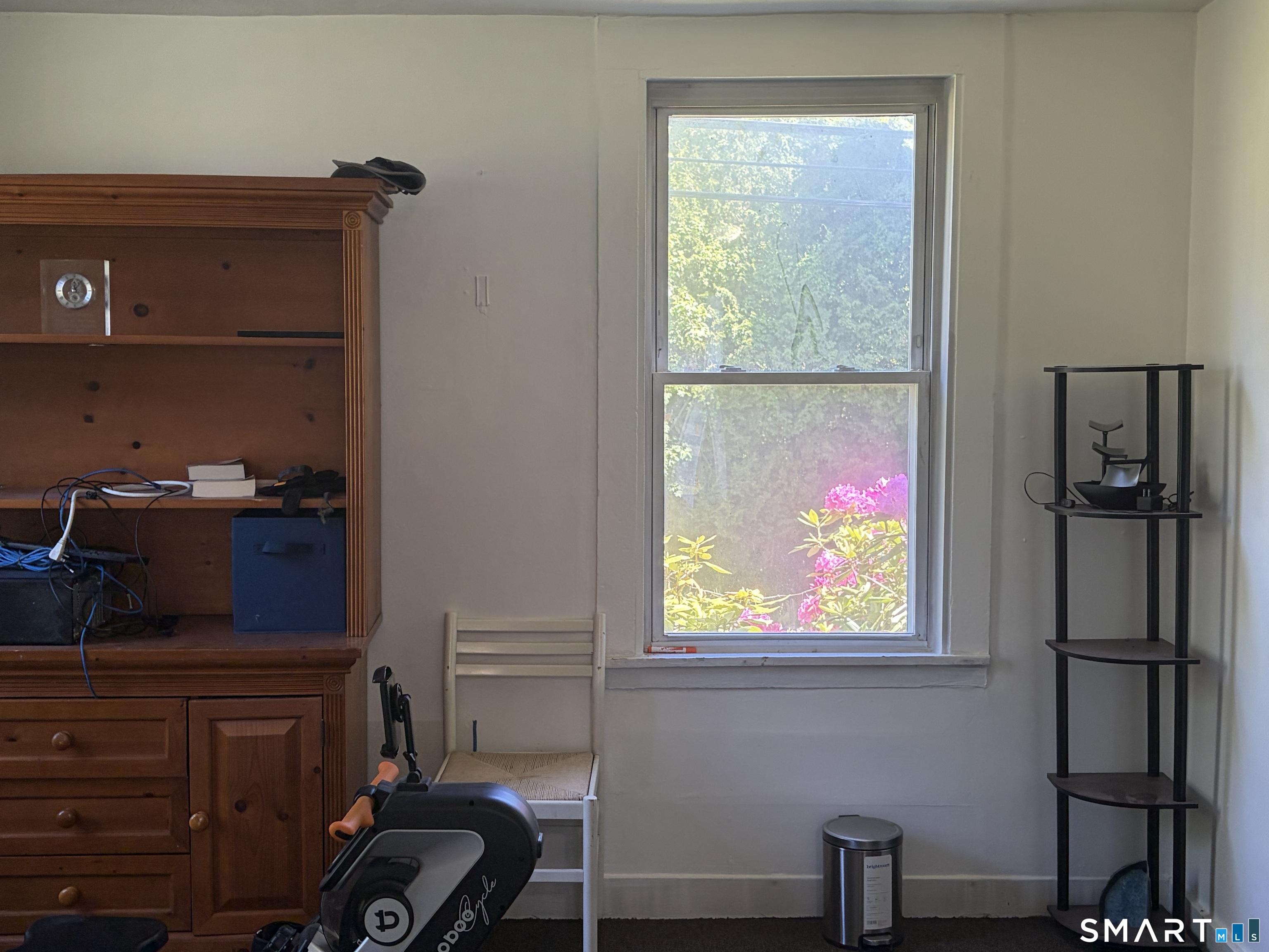 1079 Main Street Coventry, CT 06238 - Photo 8 of 19 a room with a window and dresser