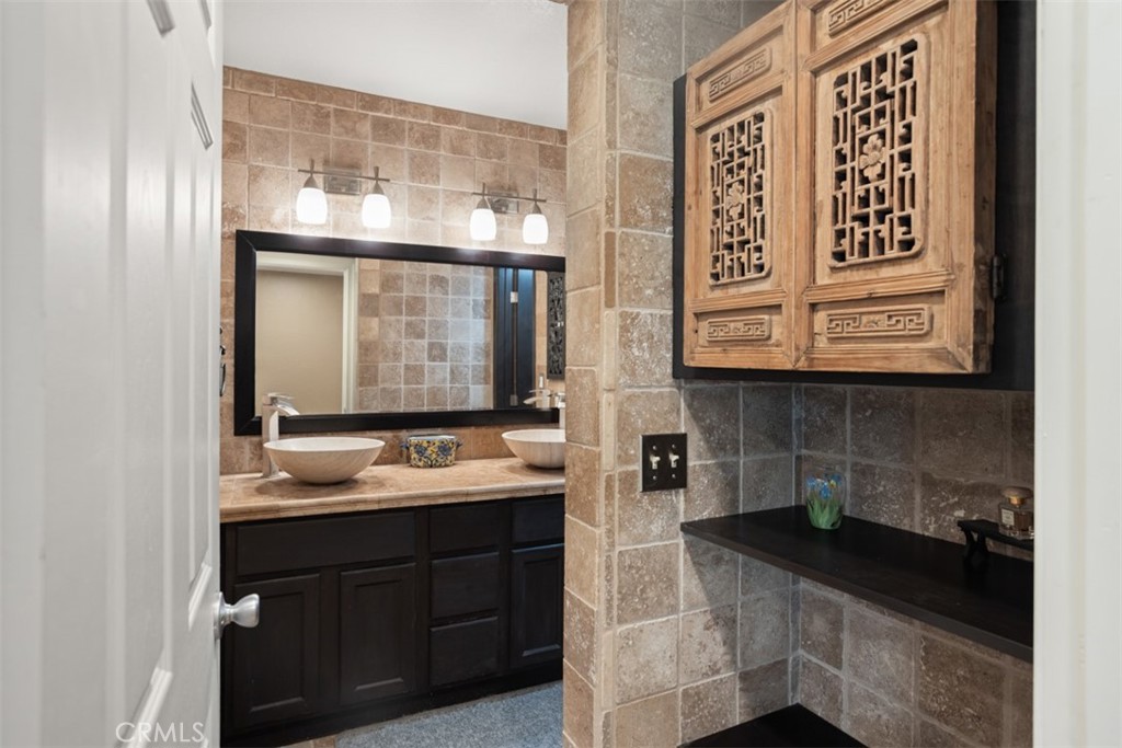 32 Columbia Irvine, CA 92612 - Photo 20 of 34 a bathroom with a sink and a mirror