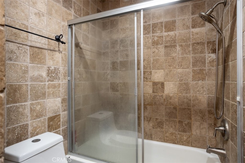 32 Columbia Irvine, CA 92612 - Photo 23 of 34 a bathroom with a shower and a toilet