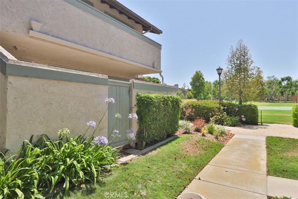 32 Columbia Irvine, CA 92612 - Photo 27 of 34 a patio with table and chairs and potted plants