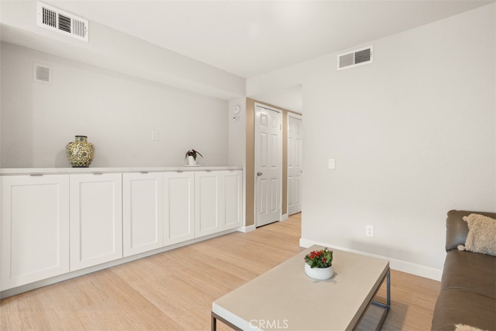32 Columbia Irvine, CA 92612 - Photo 7 of 34 a living room with table and chair