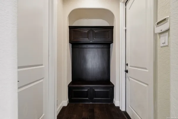 a view of entryway with wooden floor