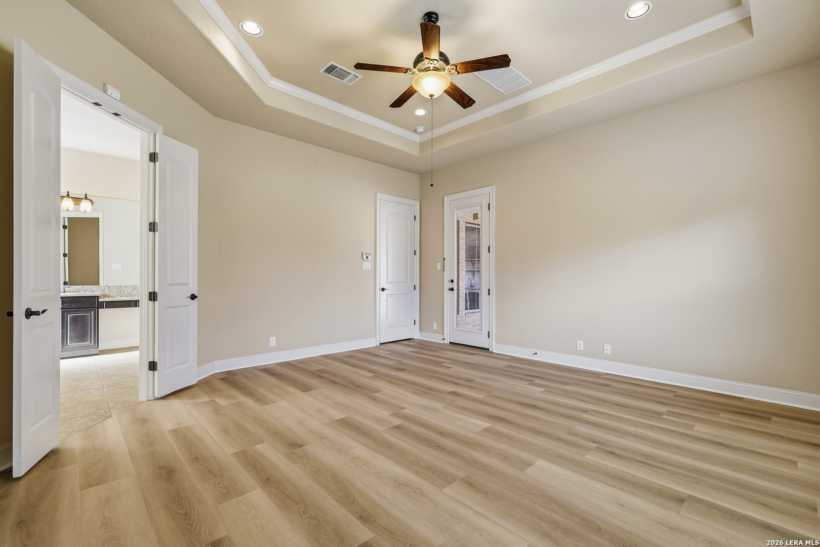 19414 Arrowood Place Garden Ridge, TX 78266 - Photo 14 of 25 a view of empty room with wooden floor and fan