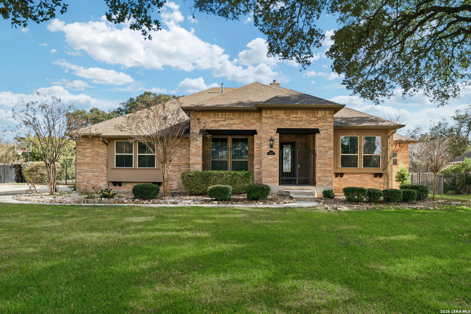 19414 Arrowood Place Garden Ridge, TX 78266 - Photo 2 of 25 a front view of a house with a yard