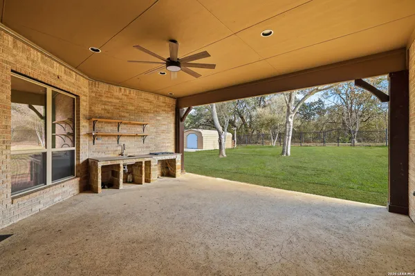 a view of a porch with a backyard