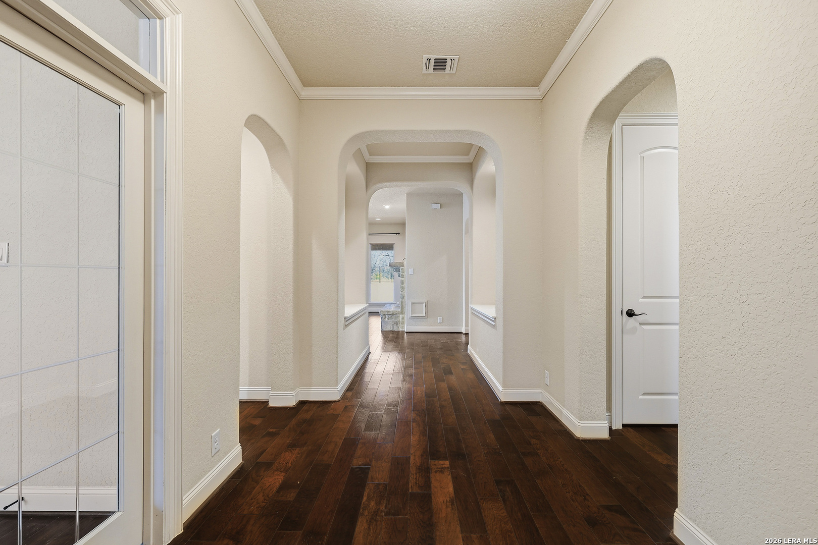 19414 Arrowood Place Garden Ridge, TX 78266 - Photo 4 of 25 a view of hallway with wooden floor