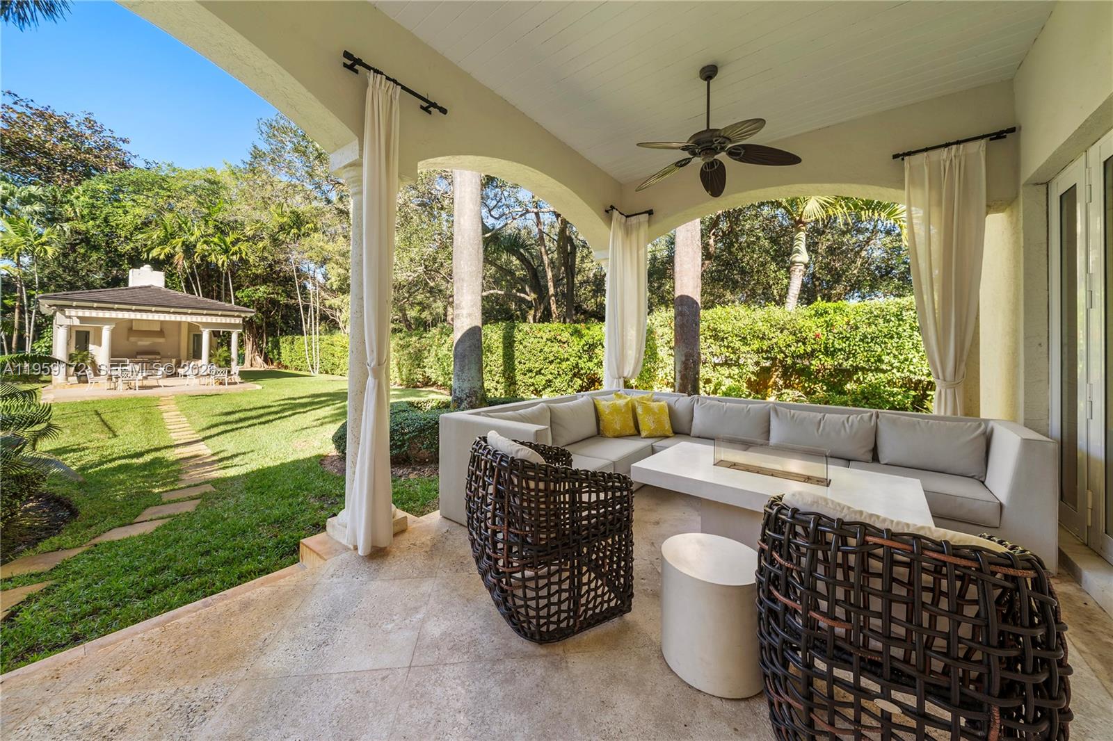 8400 School House Road Miami, FL 33143 - Photo 12 of 66 a living room with patio furniture and a porch