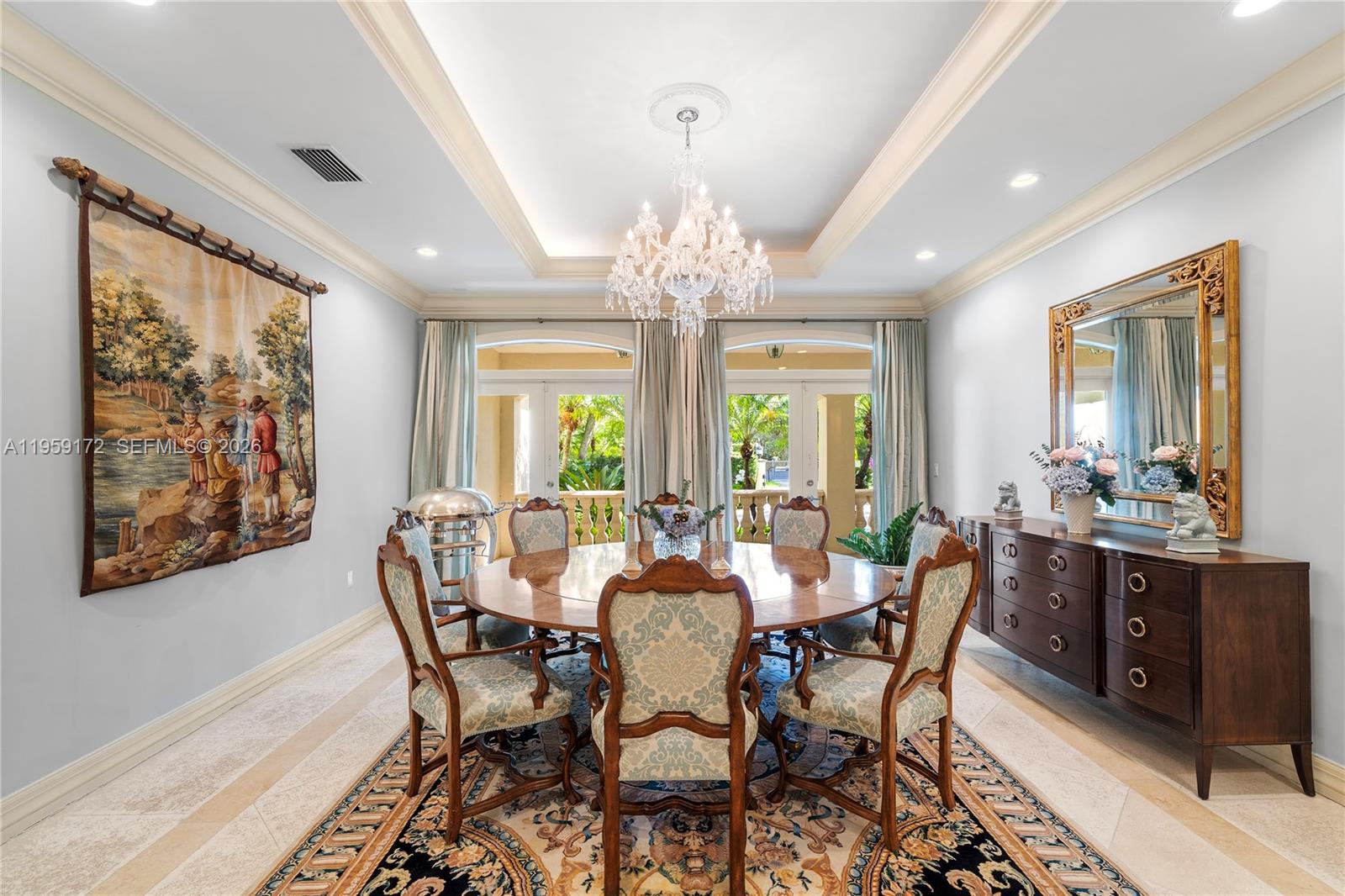 8400 School House Road Miami, FL 33143 - Photo 22 of 66 a view of a dining room with furniture a chandelier and wooden floor