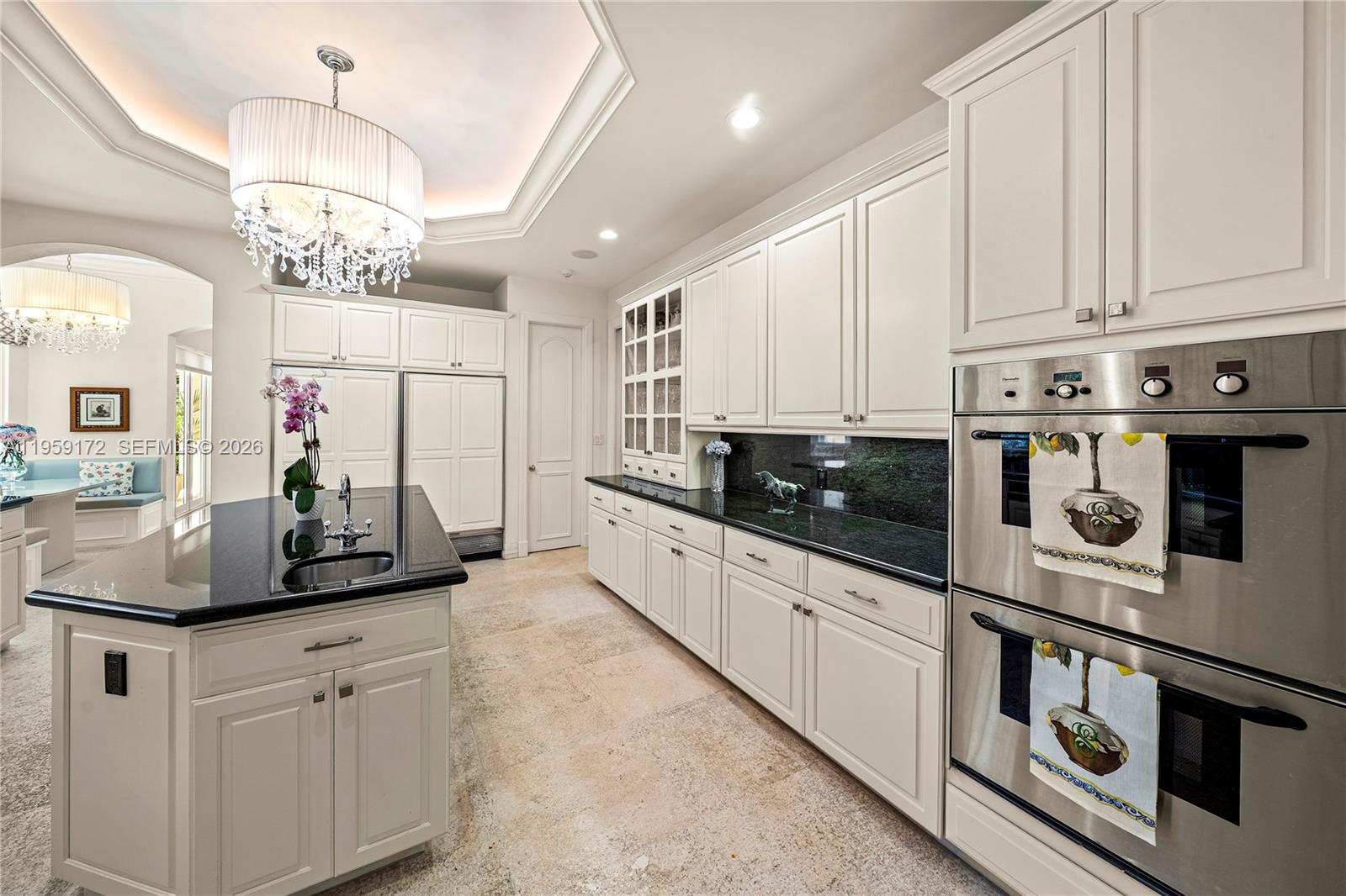 8400 School House Road Miami, FL 33143 - Photo 27 of 66 a kitchen with stainless steel appliances granite countertop a sink and cabinets