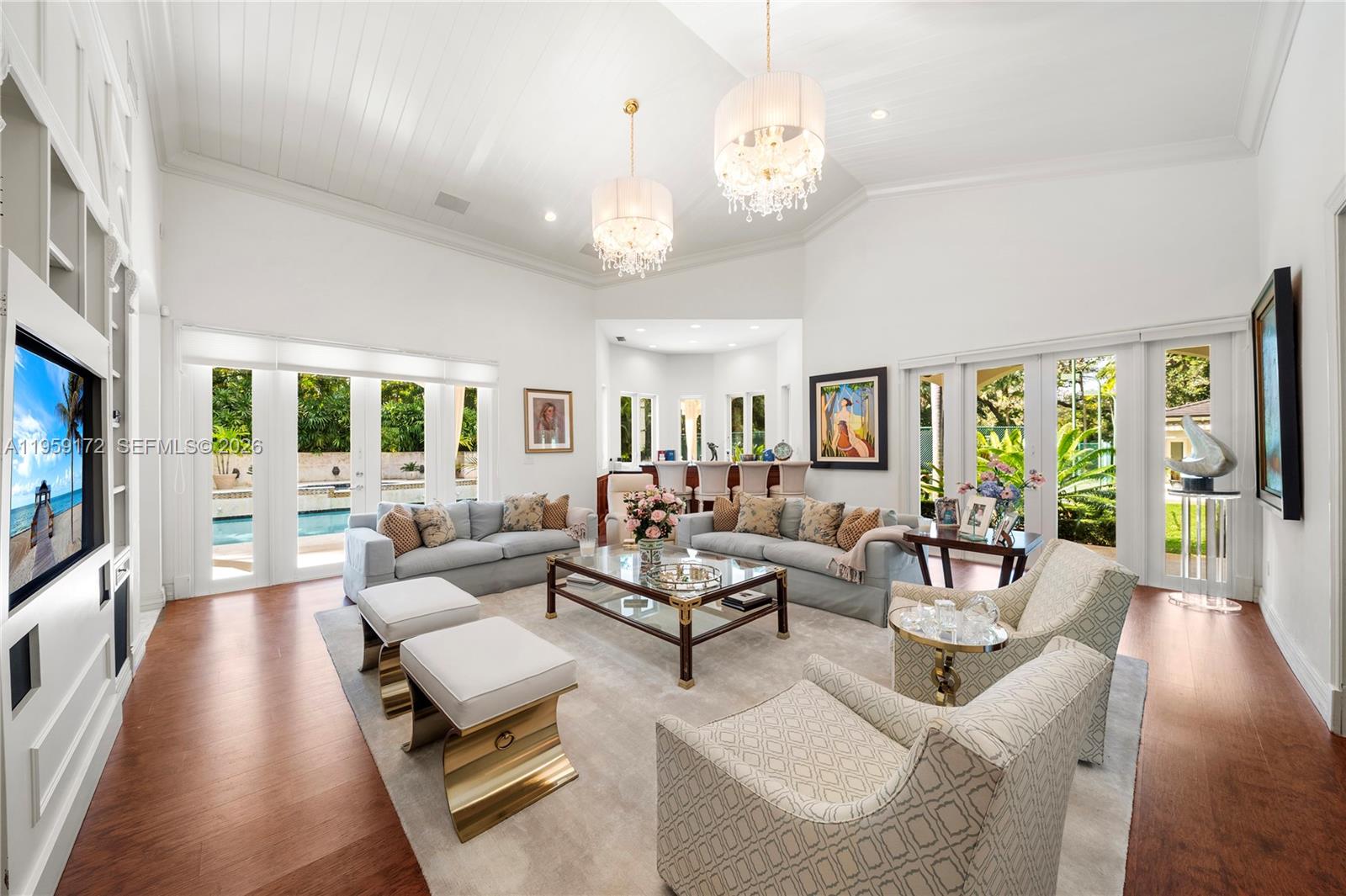 8400 School House Road Miami, FL 33143 - Photo 33 of 66 a living room with furniture large window and wooden floor