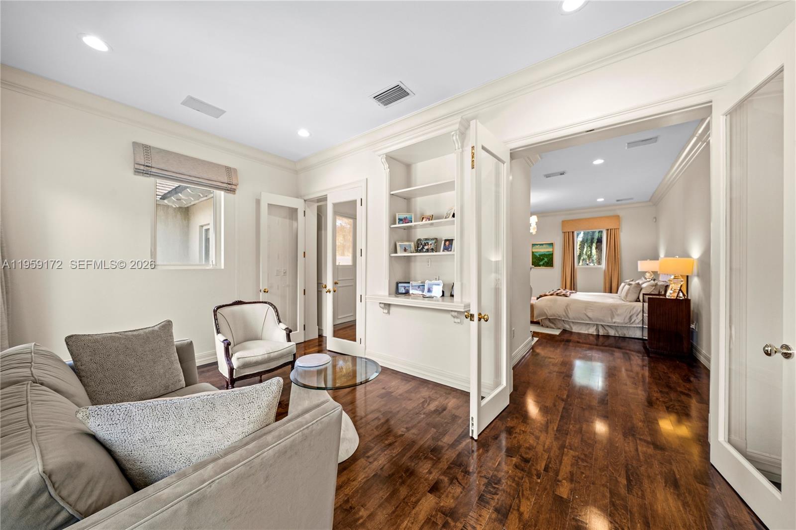 8400 School House Road Miami, FL 33143 - Photo 38 of 66 a living room with furniture and a wooden floor