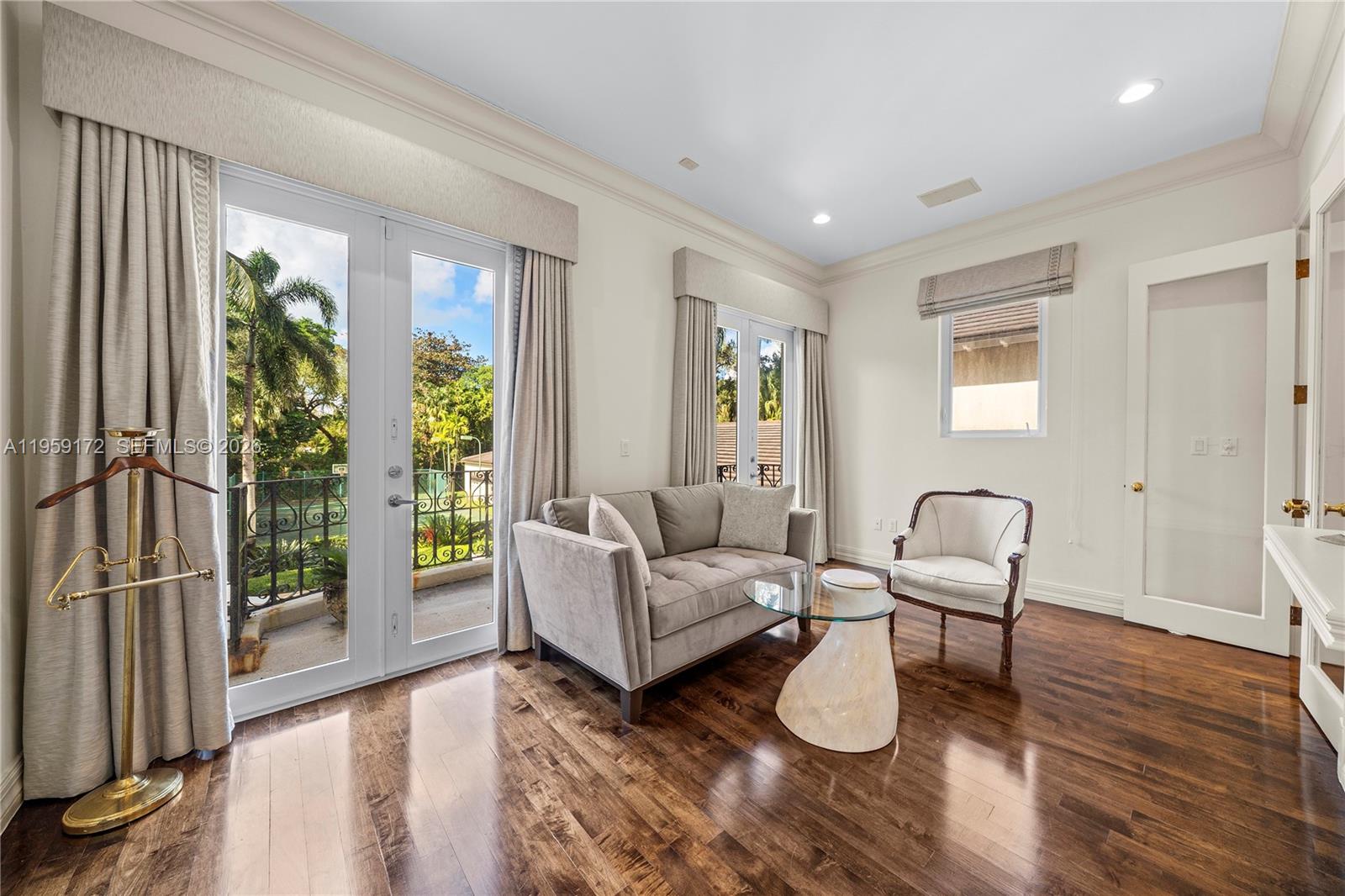8400 School House Road Miami, FL 33143 - Photo 39 of 66 a living room with furniture and a large window