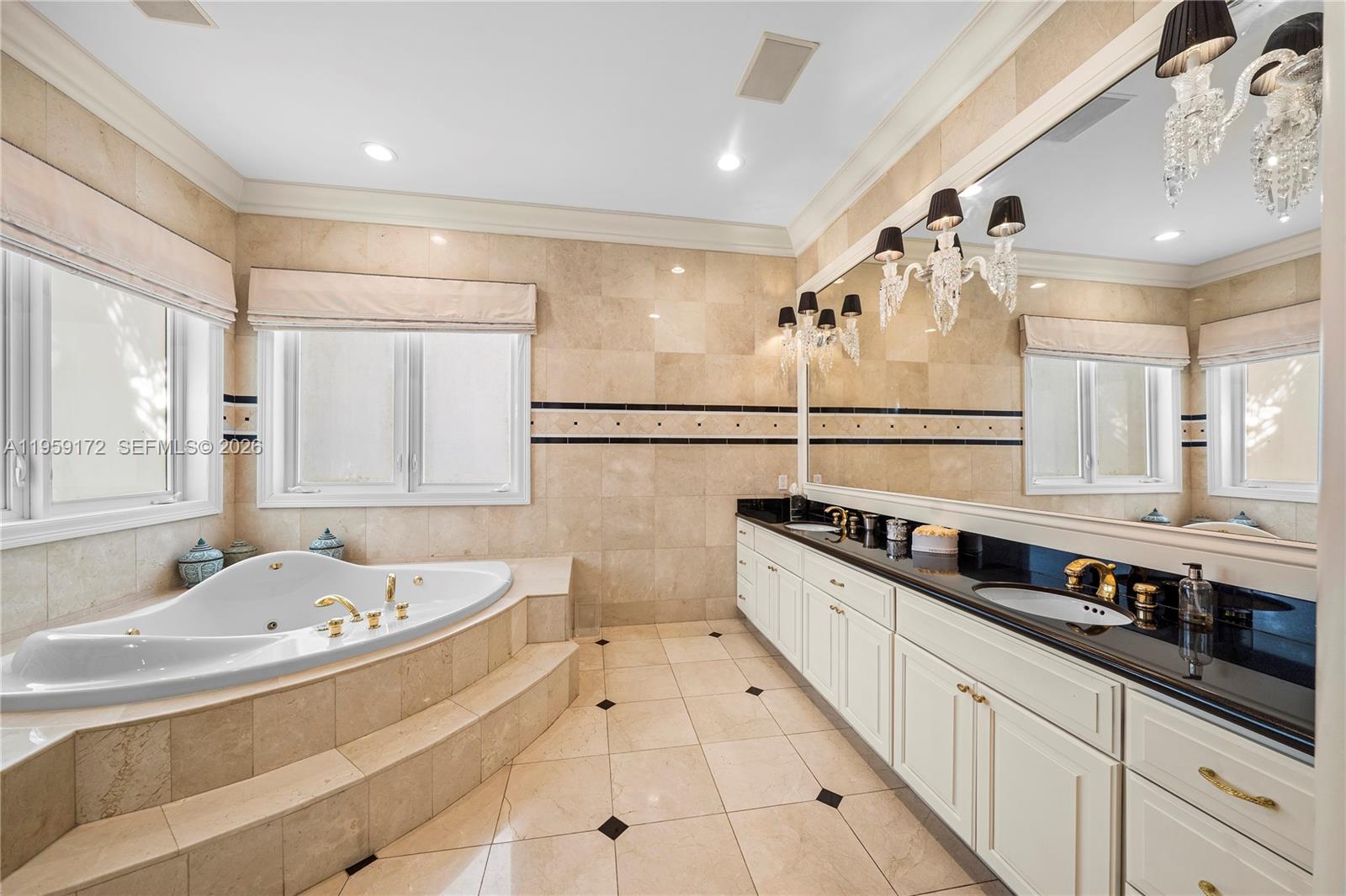 8400 School House Road Miami, FL 33143 - Photo 43 of 66 a large white kitchen with a large window