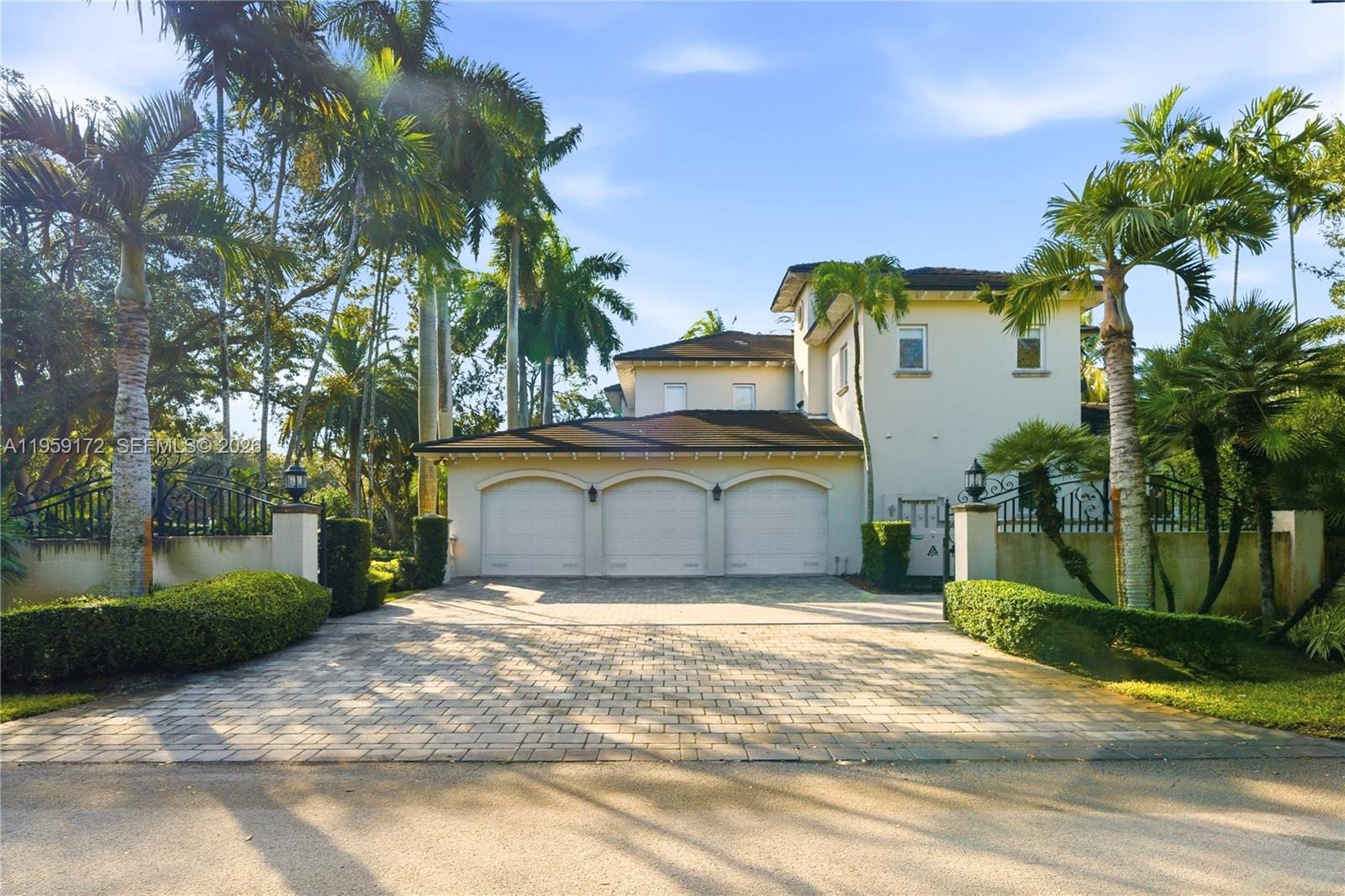 8400 School House Road Miami, FL 33143 - Photo 5 of 66 a view of a house with backyard and tree