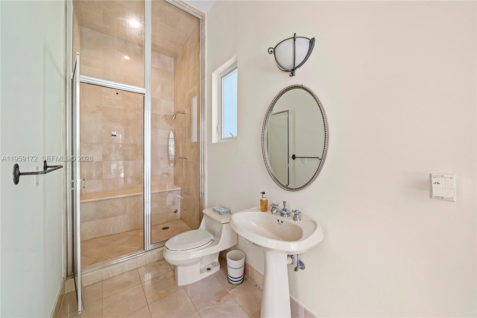 8400 School House Road Miami, FL 33143 - Photo 62 of 66 a bathroom with a sink toilet and shower