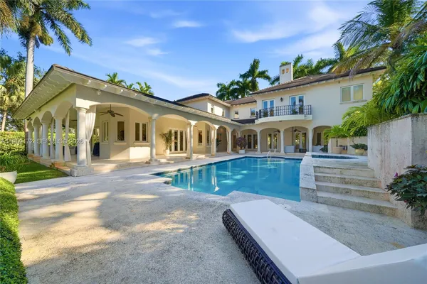 a view of a house with a swimming pool