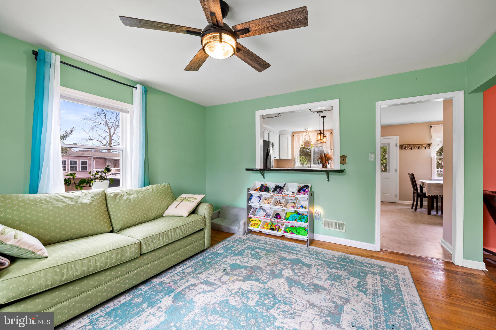5617 Allender Road White Marsh, MD 21162 - Photo 16 of 32 Charming green living space with light.