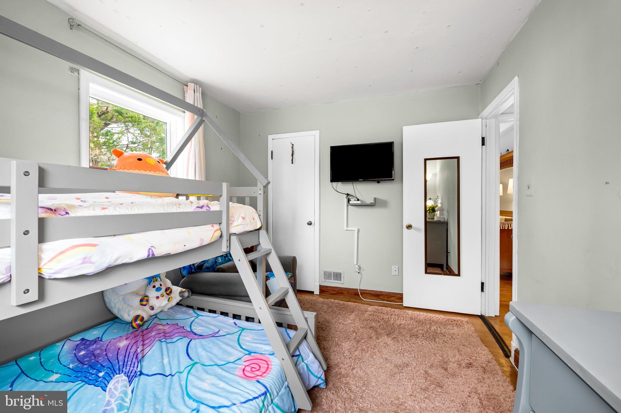 5617 Allender Road White Marsh, MD 21162 - Photo 22 of 32 Cozy kids' room with bunk beds.