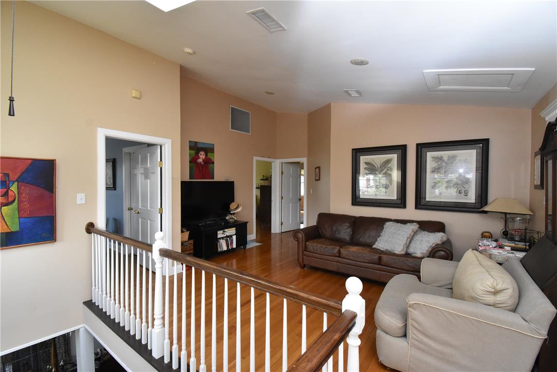 424 Grape Street Whitehall, PA 18052 - Photo 25 of 50 This inviting loft features warm hardwood floors, creating an atmosphere of comfort and relaxation.