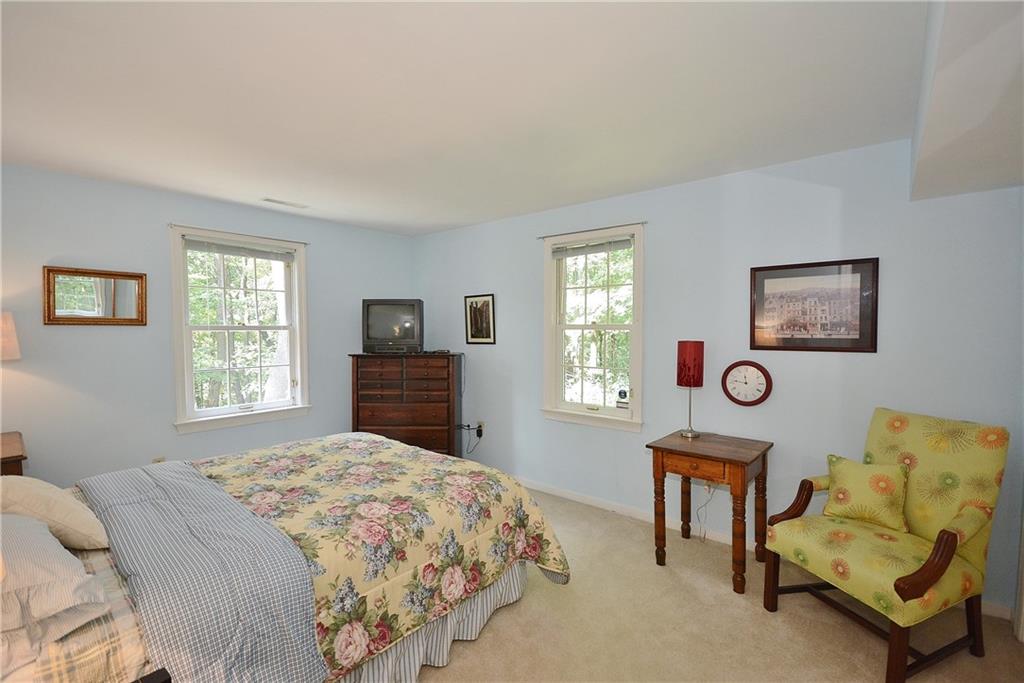 301 Wildberry Road Pittsburgh, PA 15238 - Photo 20 of 24 Attractive bedroom with plenty of windows/daylight in lower level adjacent to a full bathroom.