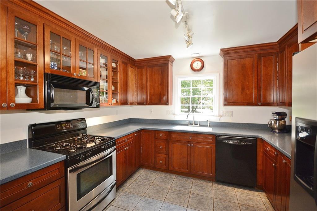301 Wildberry Road Pittsburgh, PA 15238 - Photo 6 of 24 Custom cabinetry with abundance of storage/counterspace. There are two ovens (one is in the adjacent laundry/pantry area).