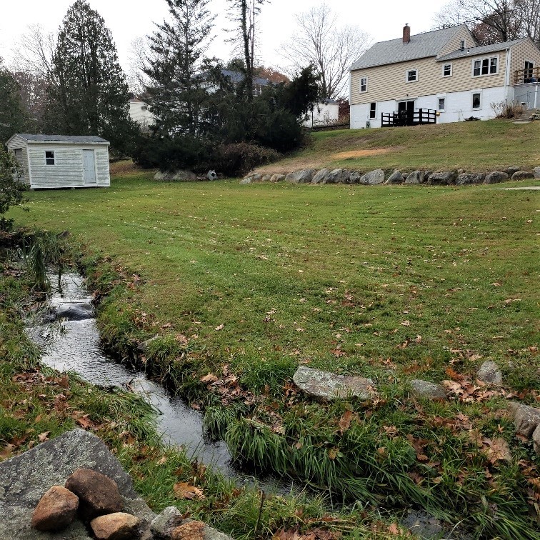 645 Knotty Oak Road Coventry, RI 02816 - Photo 4 of 35 Back lot with babbling brook