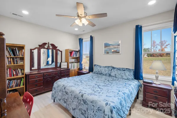 a bedroom with a bed and a closet