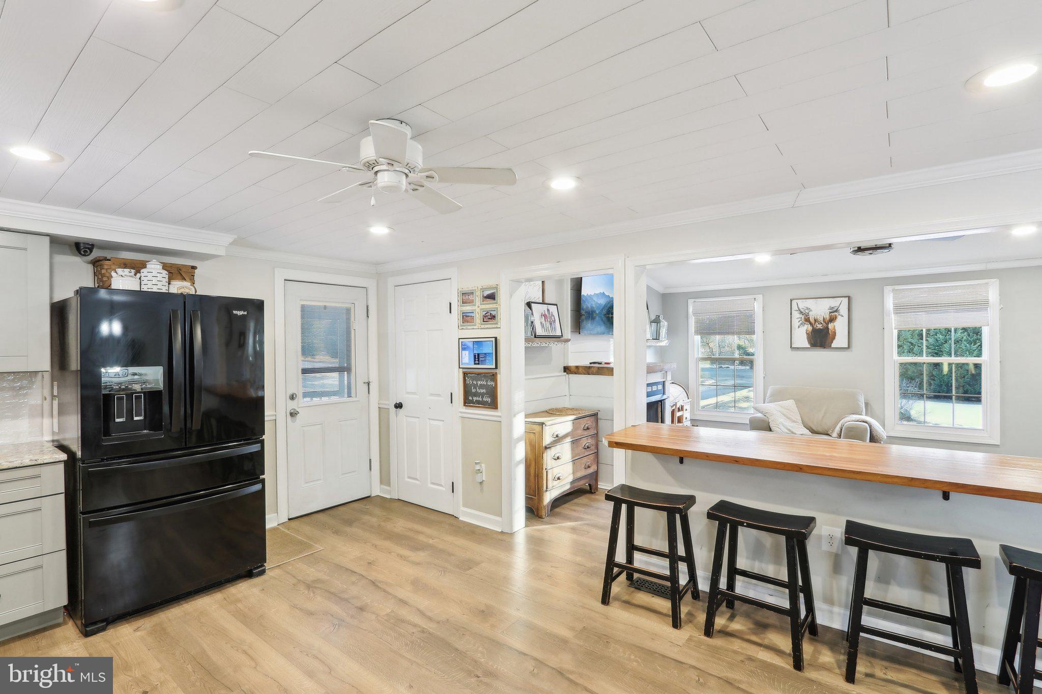 364 Almond Road Pittsgrove, NJ 08318 - Photo 35 of 51 a kitchen with refrigerator cabinets and wooden floor