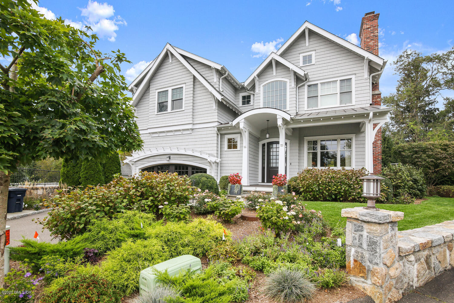 7 Finney Knoll Riverside, CT 06878 - Photo 1 of 30 a front view of a house with garden