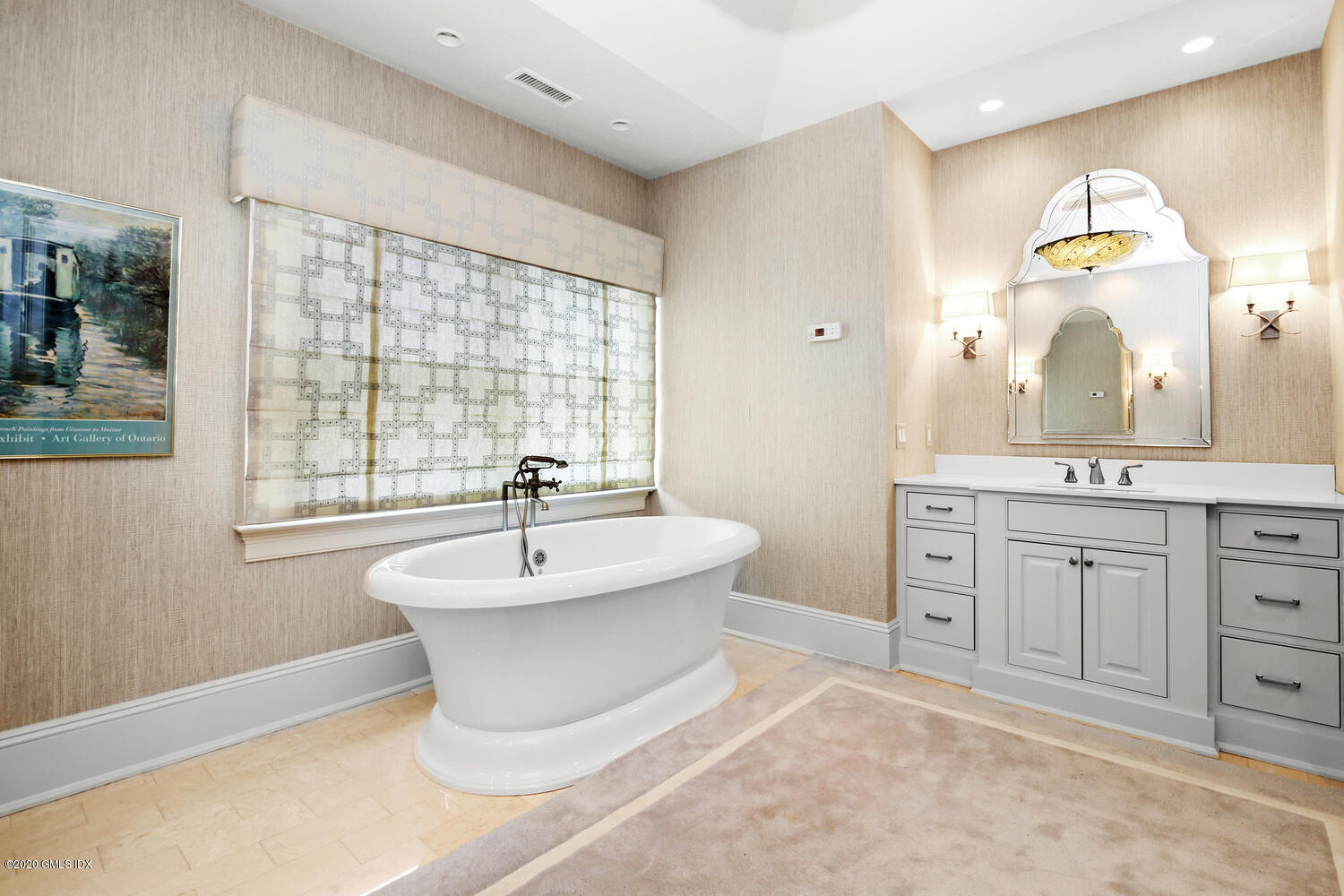 7 Finney Knoll Riverside, CT 06878 - Photo 15 of 30 a spacious bathroom with a double vanity sink a mirror and a bathtub