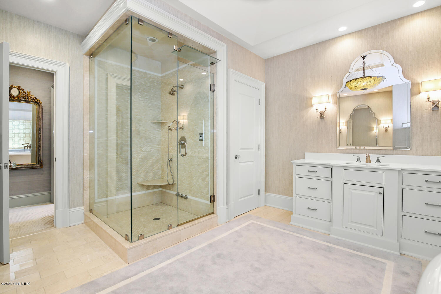 7 Finney Knoll Riverside, CT 06878 - Photo 16 of 30 a bathroom with a shower sink and mirror