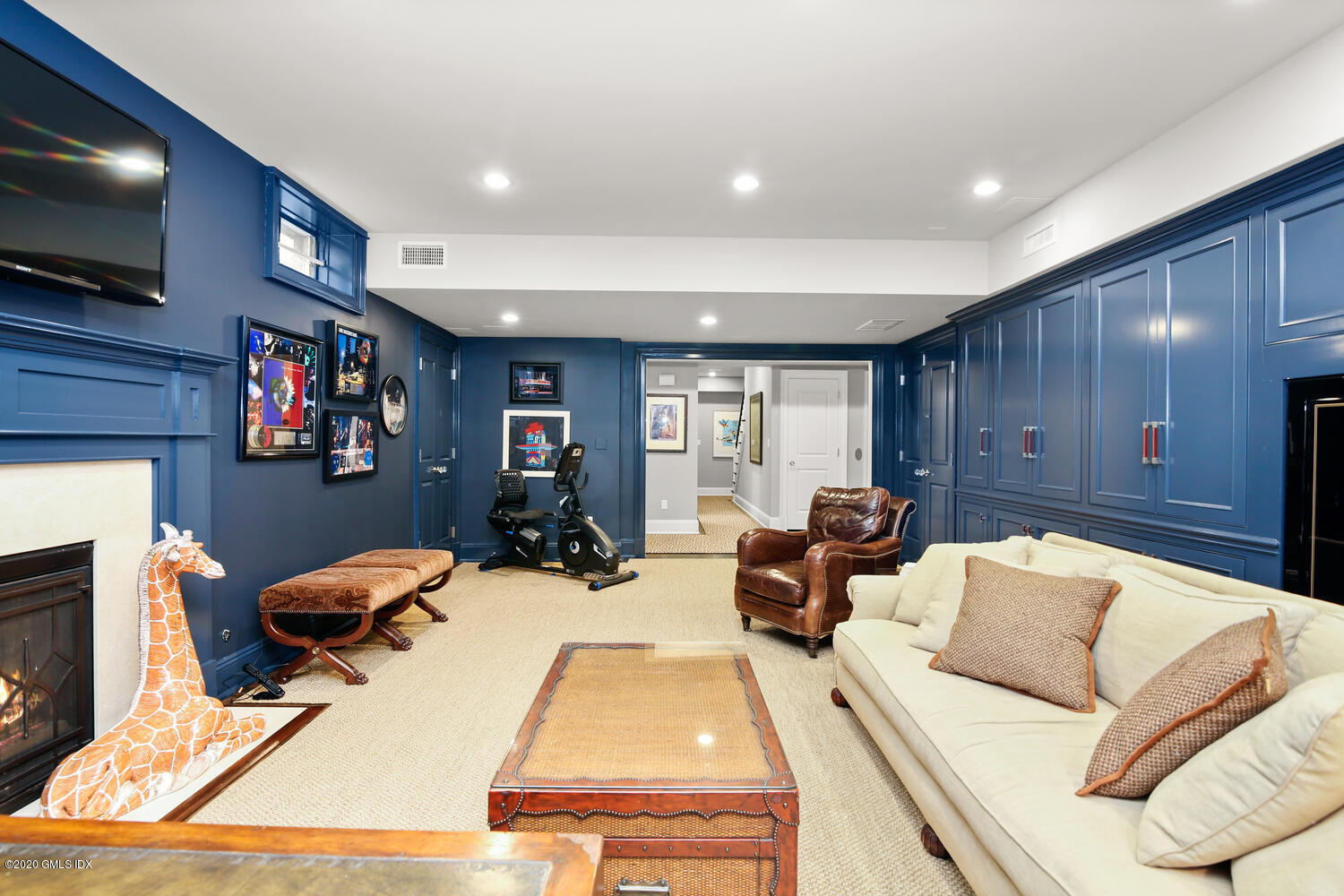 7 Finney Knoll Riverside, CT 06878 - Photo 21 of 30 a view of a living room with furniture and a flat screen tv