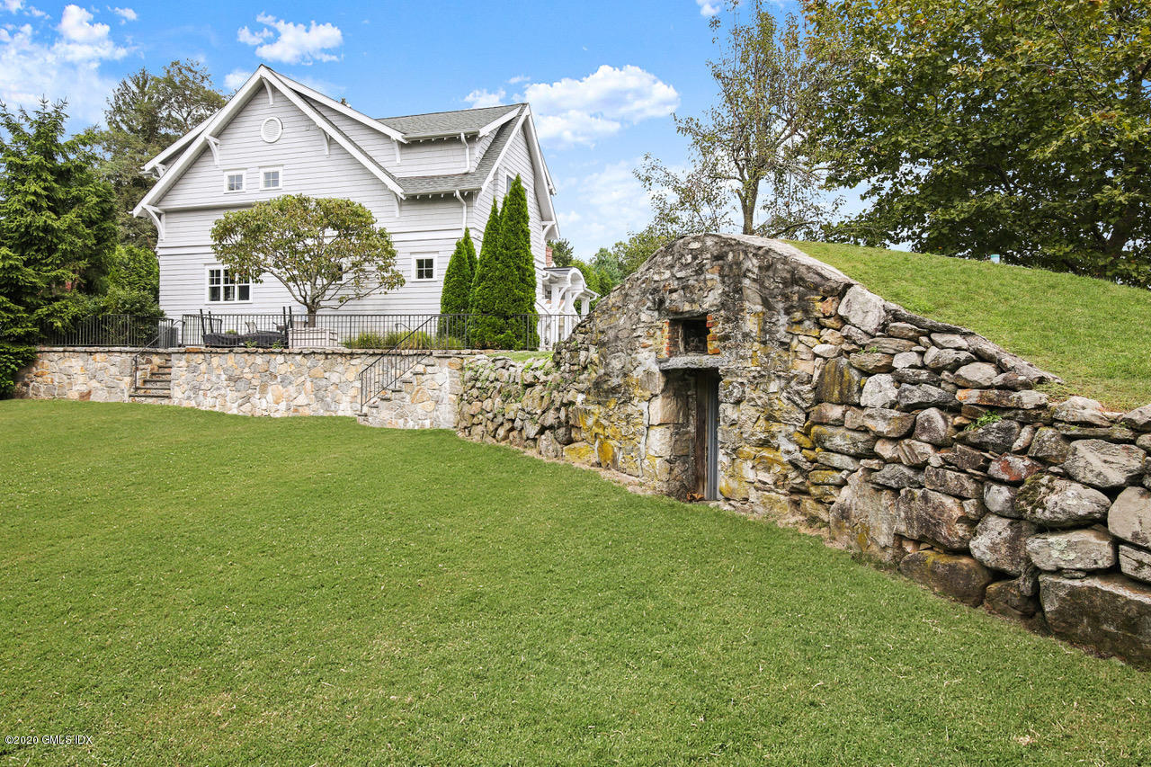 7 Finney Knoll Riverside, CT 06878 - Photo 27 of 30 a front view of house with yard