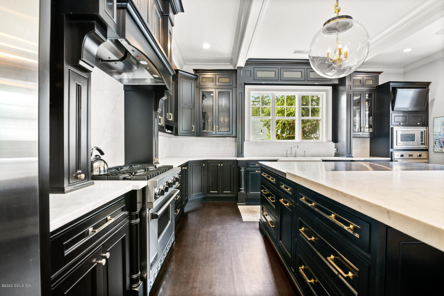 7 Finney Knoll Riverside, CT 06878 - Photo 8 of 30 a kitchen with stainless steel appliances a sink and a stove