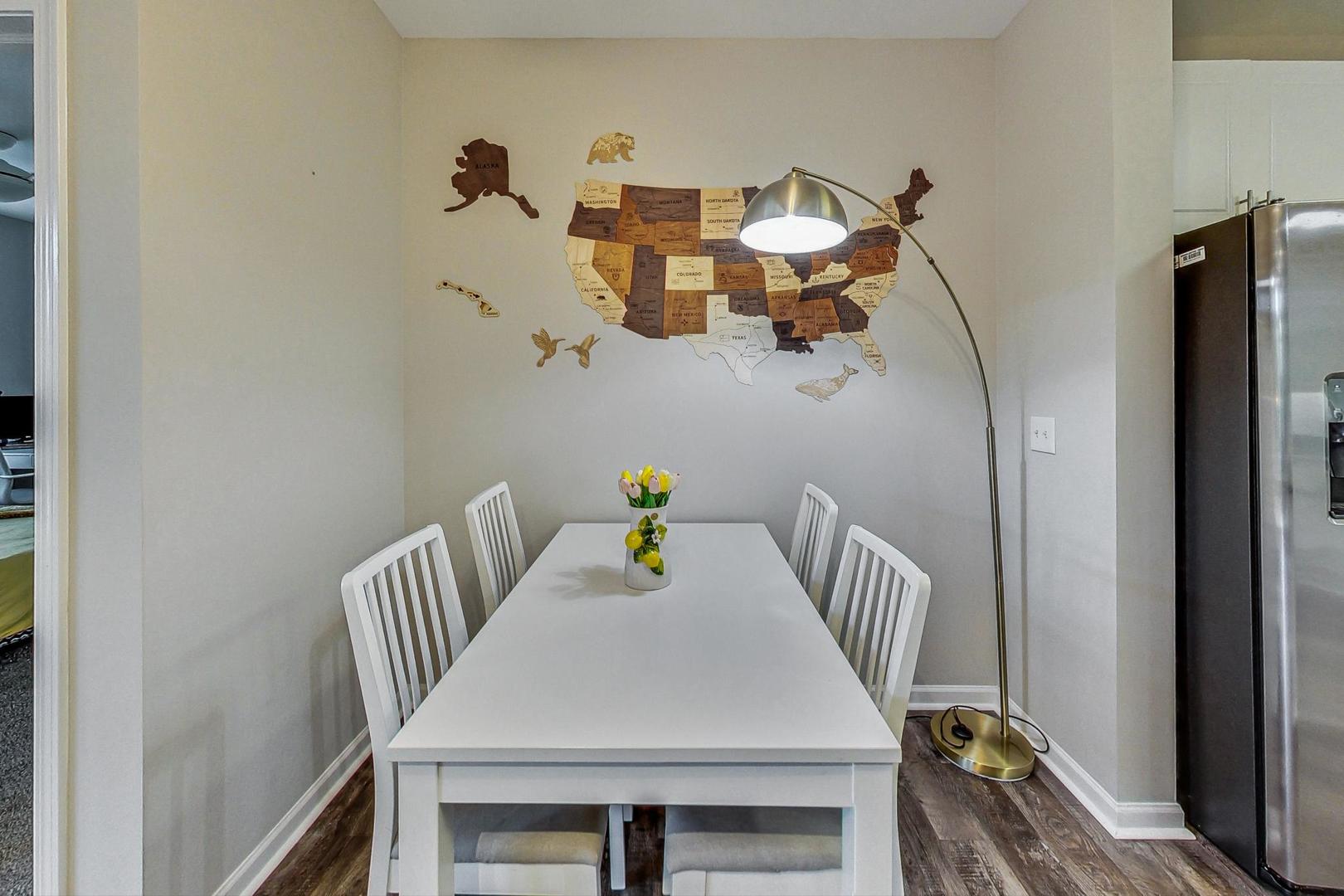 640 McHenry Road, Unit 203 Wheeling, IL 60090 - Photo 17 of 41 a view of dining room and livingroom with furniture