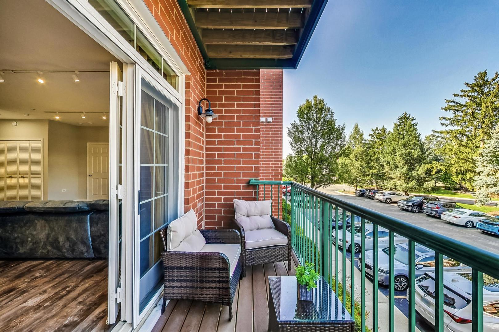 640 McHenry Road, Unit 203 Wheeling, IL 60090 - Photo 22 of 41 a view of balcony with furniture