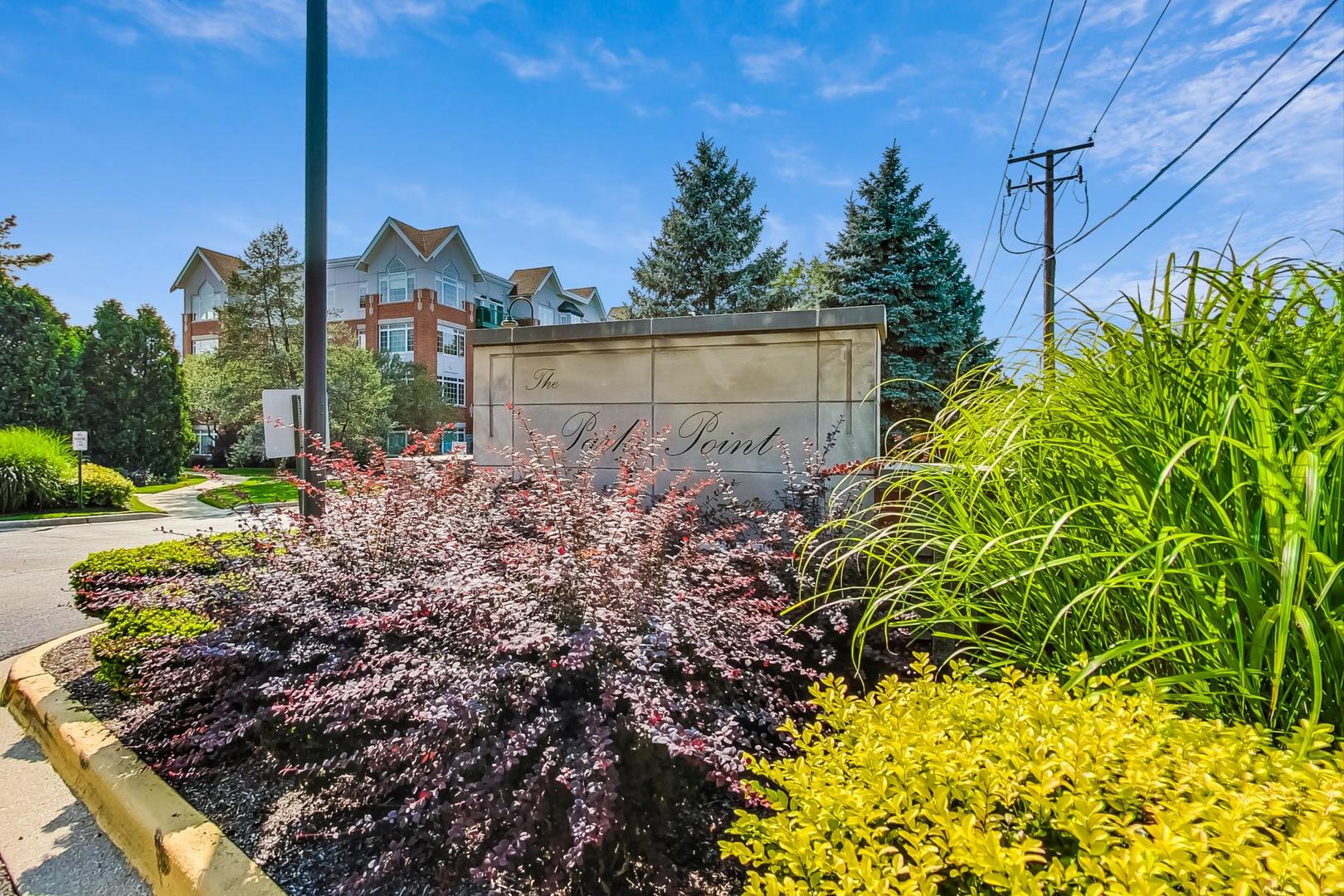 640 McHenry Road, Unit 203 Wheeling, IL 60090 - Photo 6 of 41 a view of a garden with plants