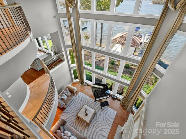 a living room with a table and chairs