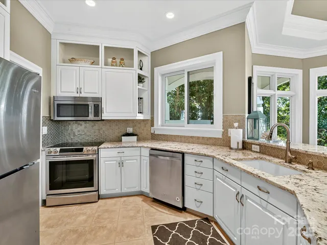 a view of a balcony with wooden floor and city view