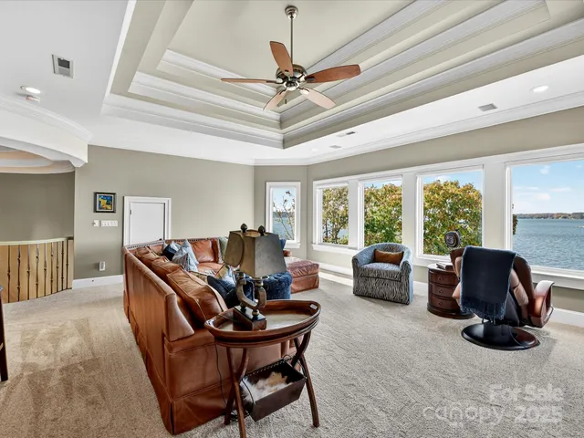 a balcony with furniture and a window