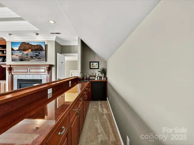a view of a swimming pool with a table and chairs