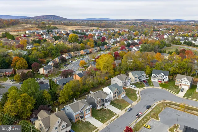 an aerial view of a city with lots of residential buildings