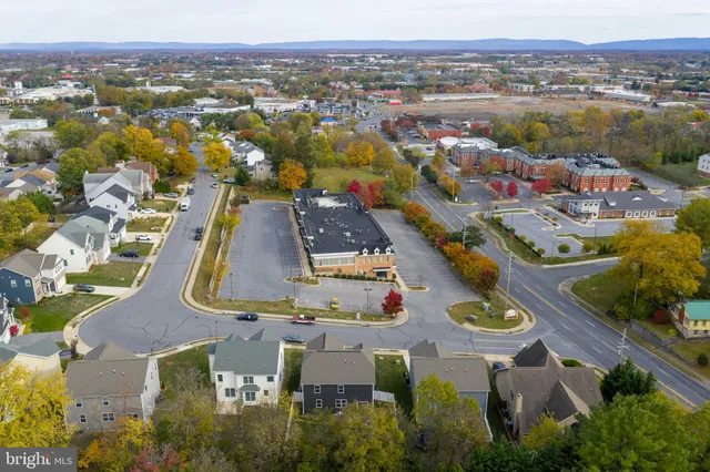 an aerial view of residential house with outdoor space