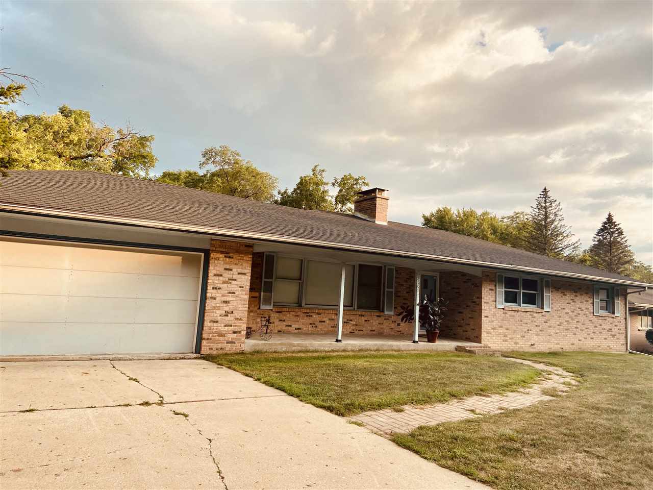 3309 Spring Creek Road Rockford, IL 61107 - Photo 1 of 17 a view of house with outdoor space and seating area