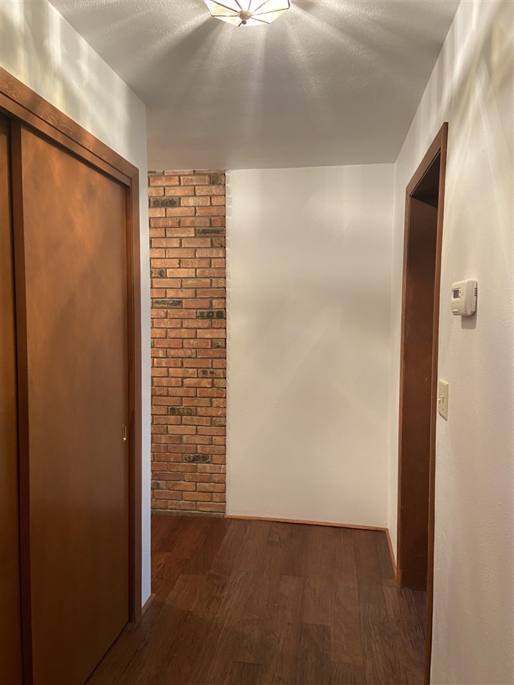 3309 Spring Creek Road Rockford, IL 61107 - Photo 13 of 17 a view of balcony with wooden floor