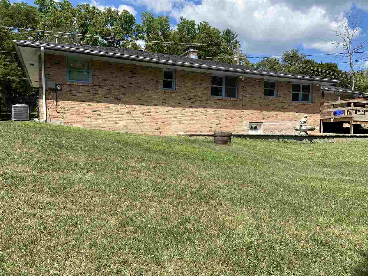 3309 Spring Creek Road Rockford, IL 61107 - Photo 2 of 17 a front view of house with yard