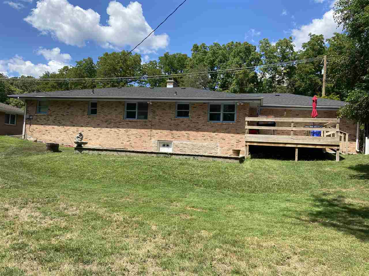 3309 Spring Creek Road Rockford, IL 61107 - Photo 3 of 17 a house view with a garden space