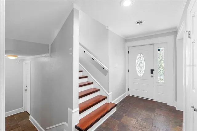 a view of entryway with wooden floor