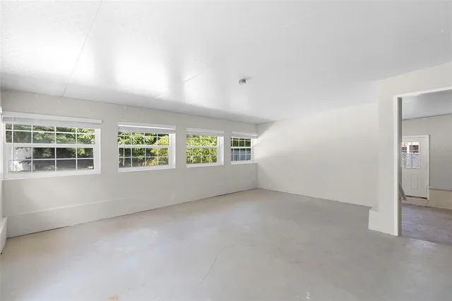 an empty room with windows